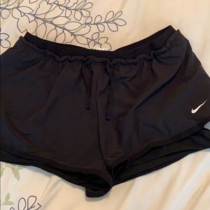 NIKE shorts with built in skort/slider. Never worn